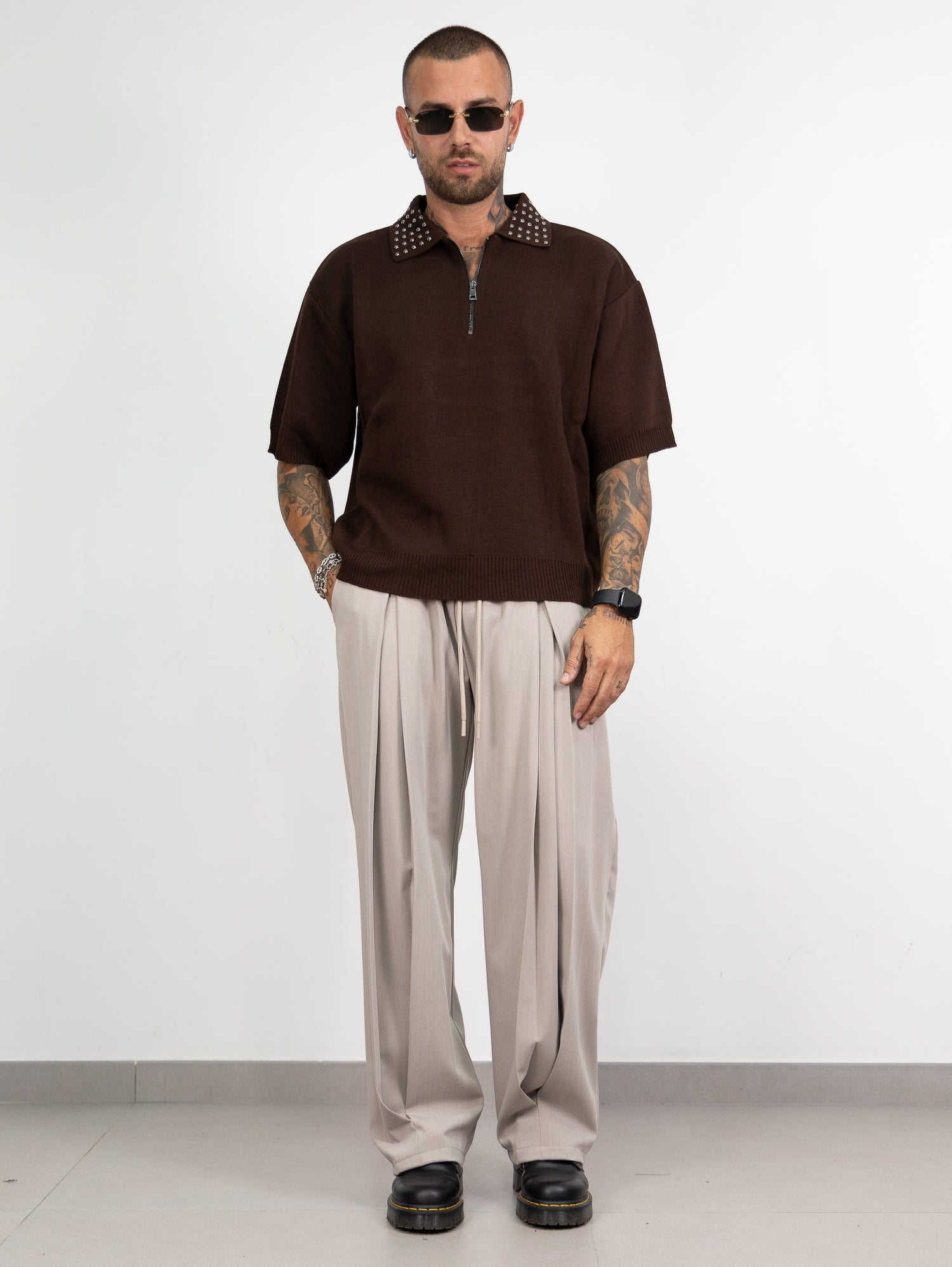 Polo mezza zip borchie