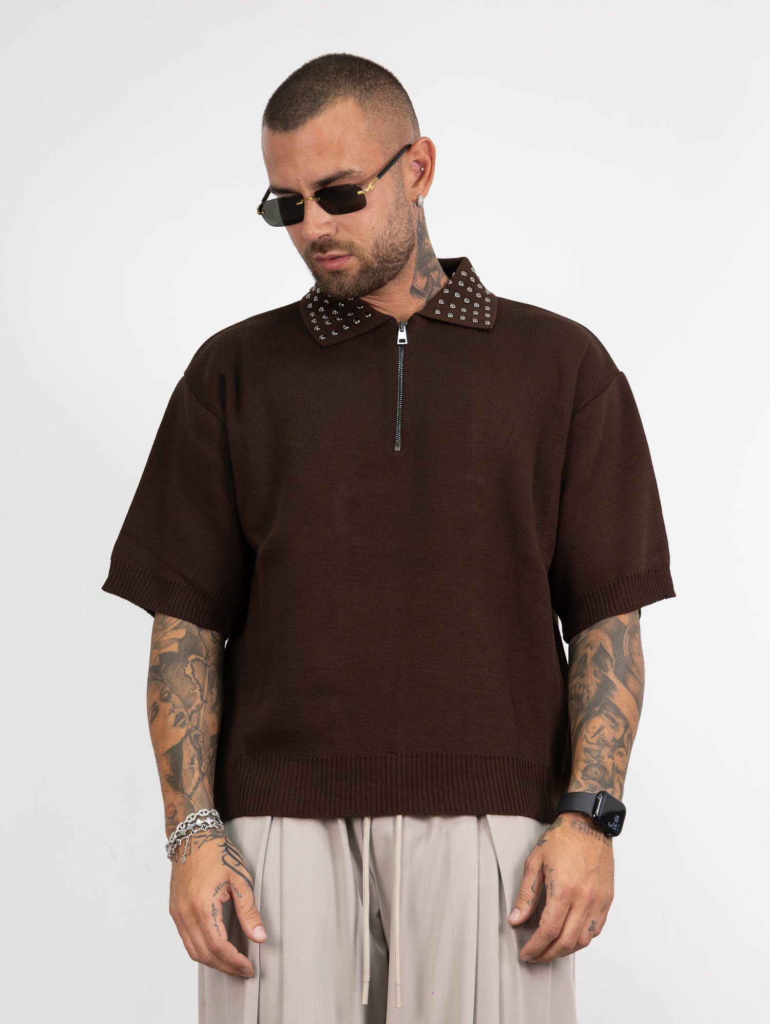 Polo mezza zip borchie
