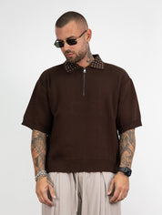 Polo mezza zip borchie