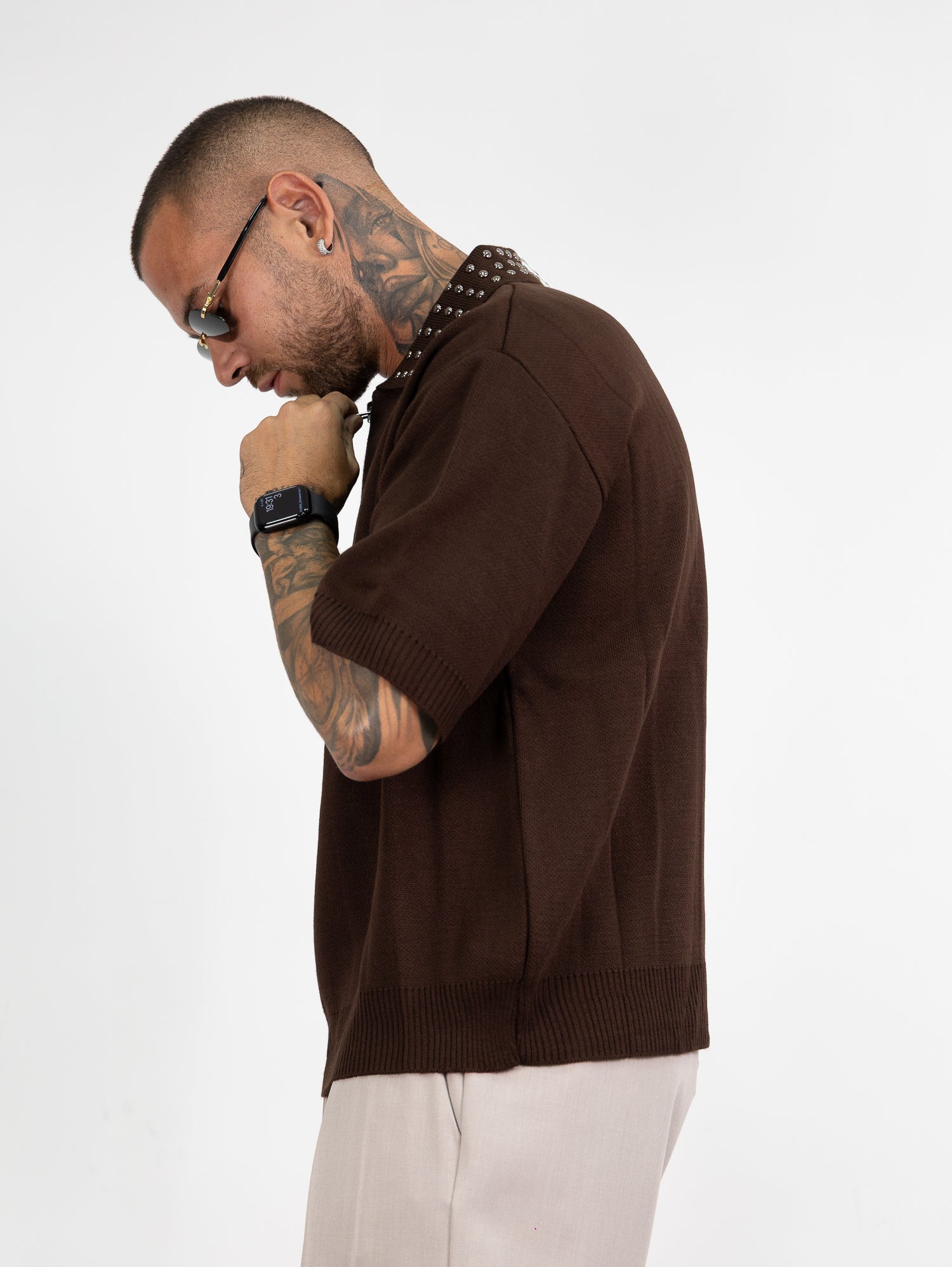 Polo mezza zip borchie