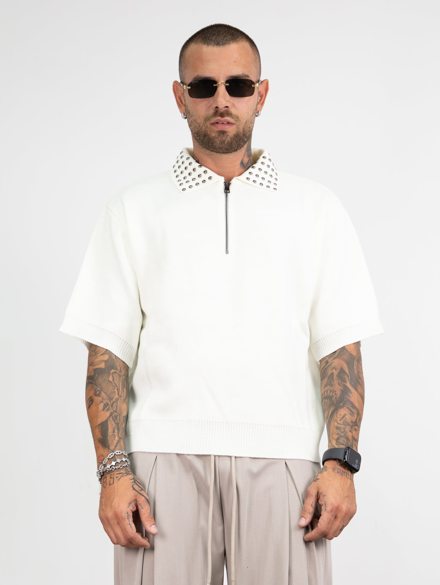 Polo mezza zip borchie