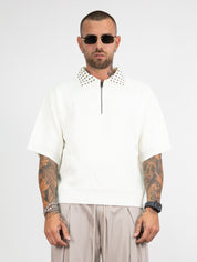 Polo mezza zip borchie