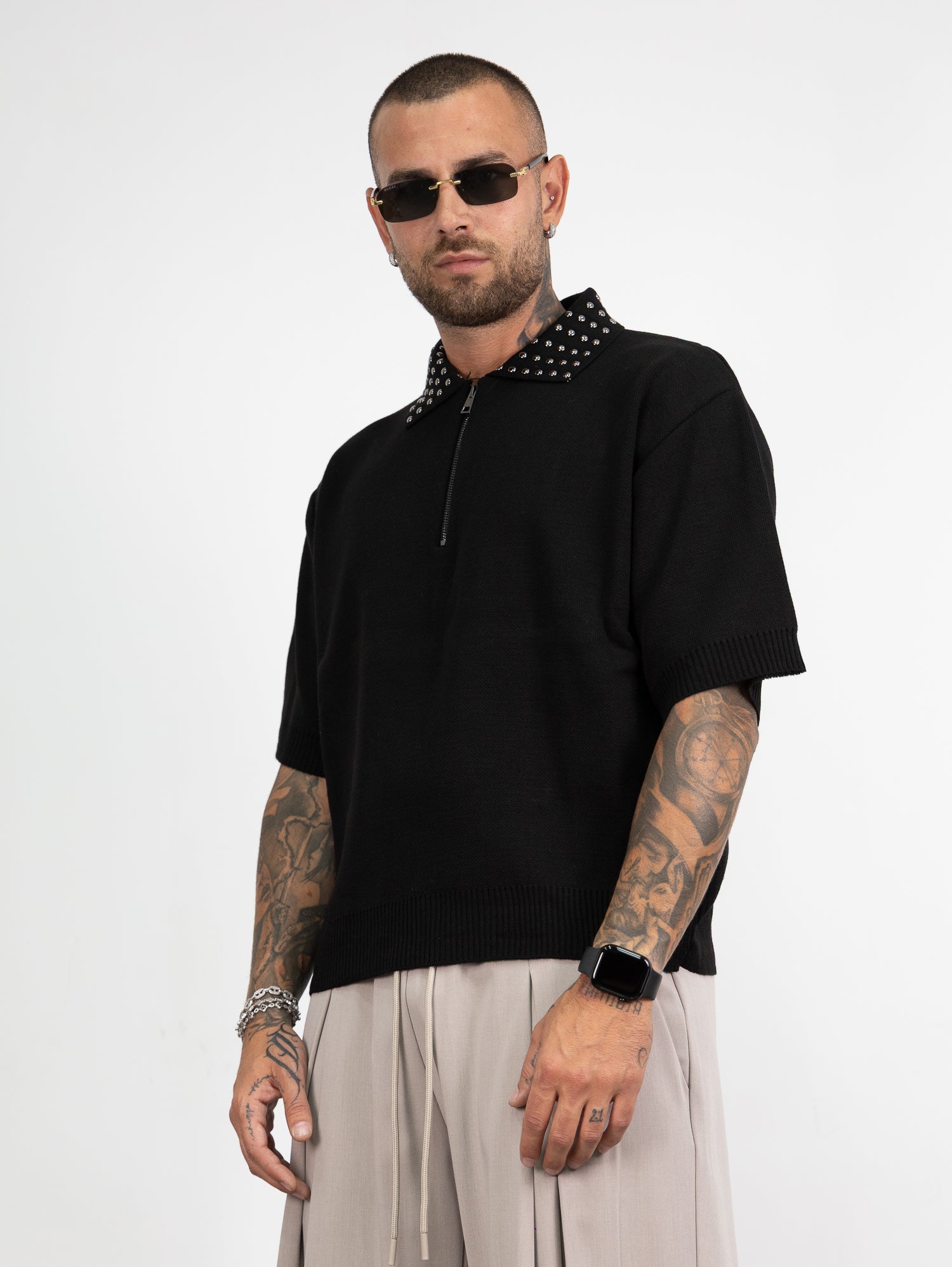 Polo mezza zip borchie
