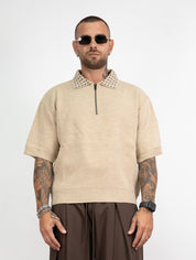 Polo mezza zip borchie