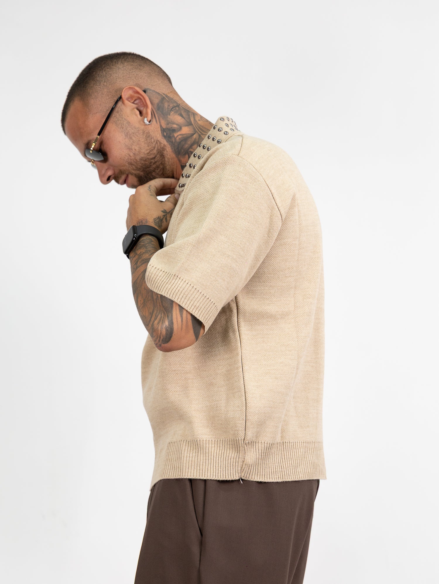 Polo mezza zip borchie