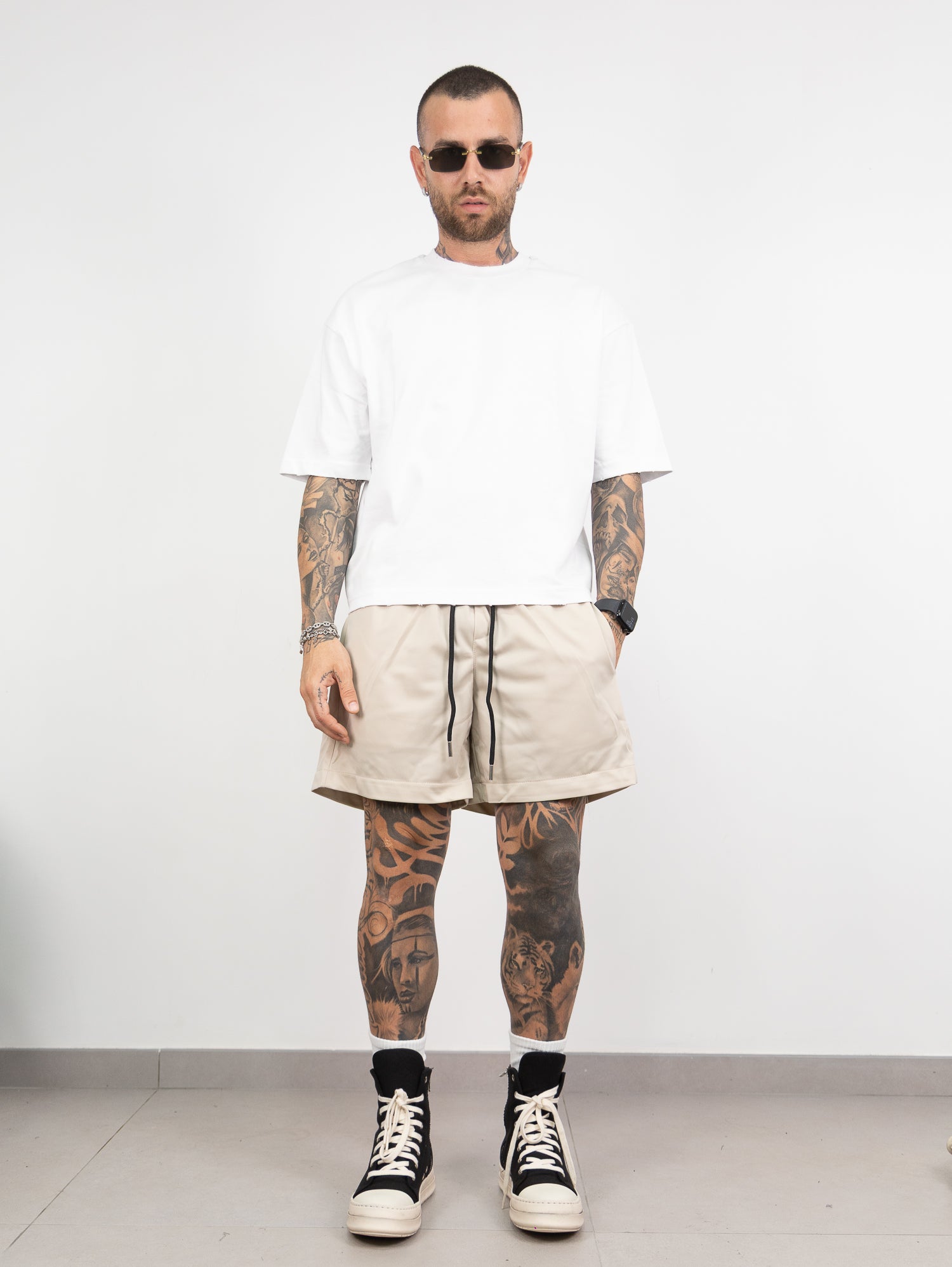Short's boxy acetato