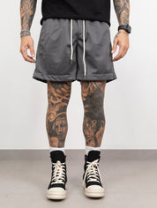 Short's boxy acetato