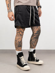 Short's boxy acetato