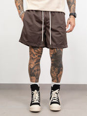 Short's boxy acetato