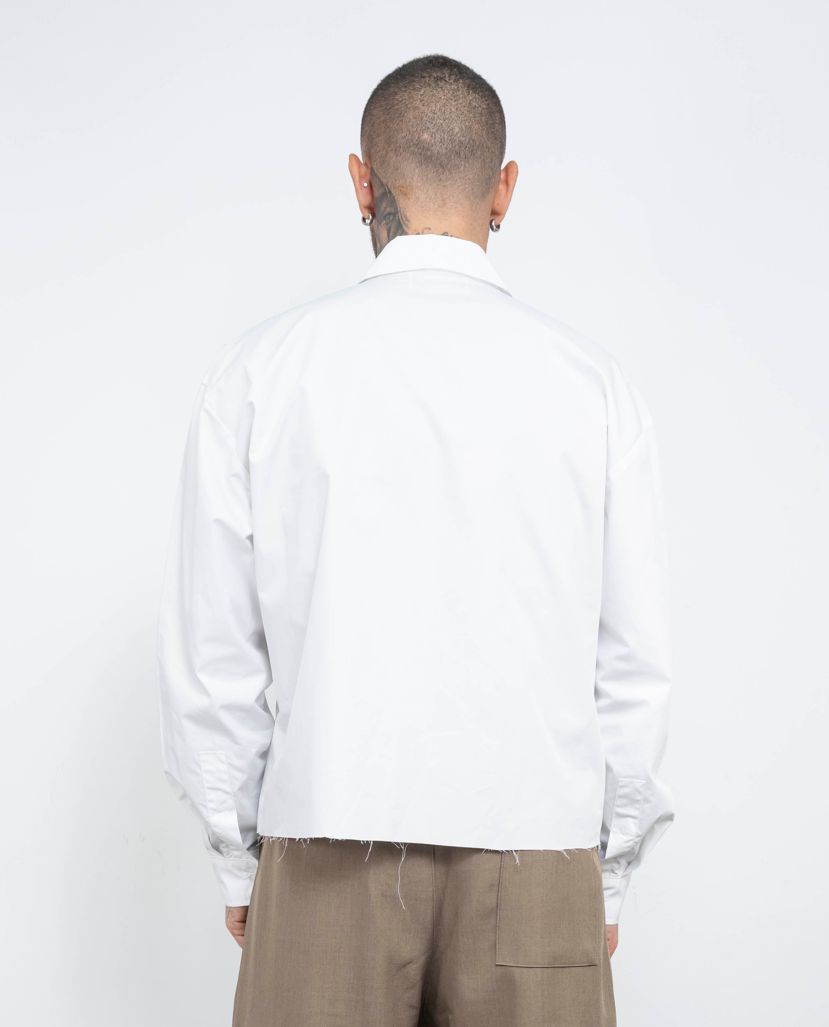 Camicia crop taglio vivo