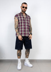 Camicia smanicata taglio vivo