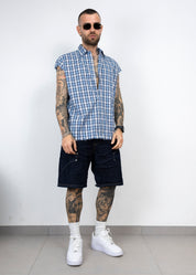 Camicia smanicata taglio vivo